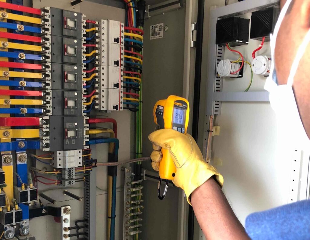 DCX Power Quality Team performing Temperature testing